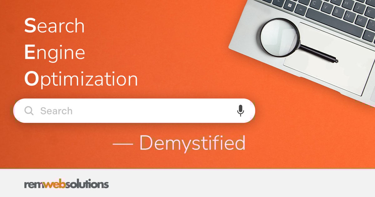 Search bar with laptop and magnifying glass.